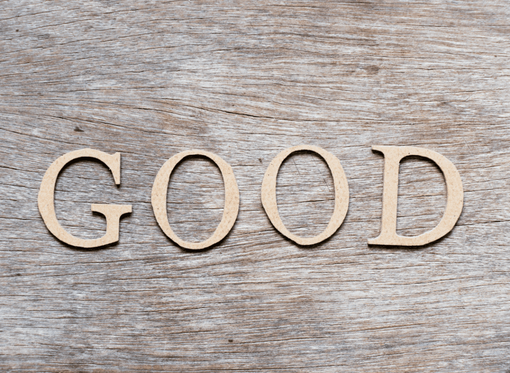 Get-One-Good-Word-Friendly-Reminder-Word-Good-on-Grain-of-Wood-Background-Sign